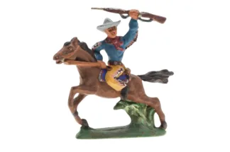 Massefigur Cowboy zu Pferd mit Gewehr