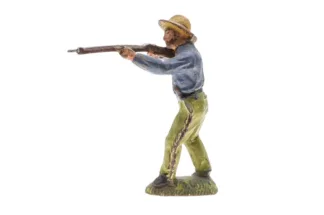 Lineol Cowboy stehend mit Gewehr schiessend