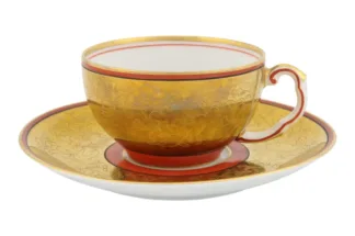 Prachtvolle Porzellan Tasse mit Untertasse in floralem Design in Gold und Orange von Thomas Bavaria